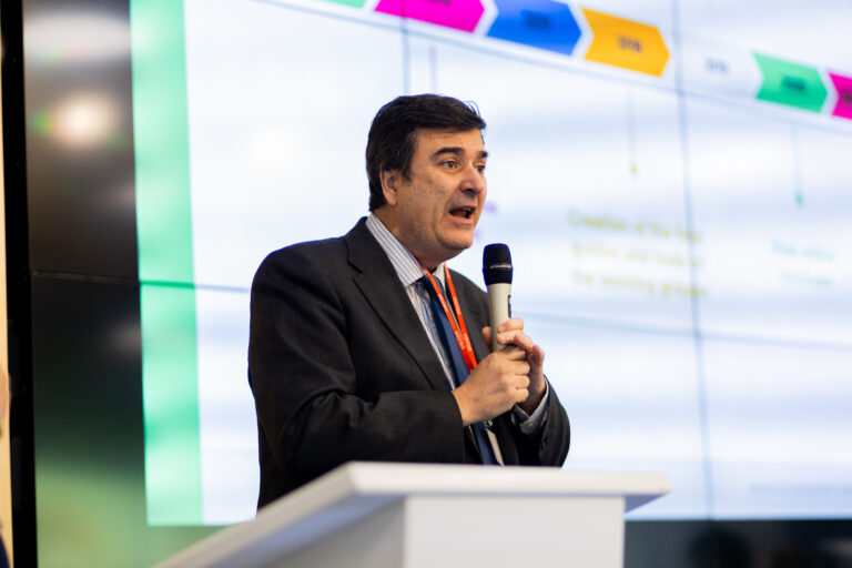 An image of Sergio Barbera presenting at FNET's 10th anniversary celebration